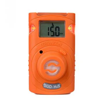 Crowcon Clip for detection of Hydrogen Sulphide. Bright orange casing with alarm lights flashing