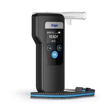 Black handheld Drager Safety 6000 breathalyser device with plastic mouthpiece attafched and a black and blue safety strap.