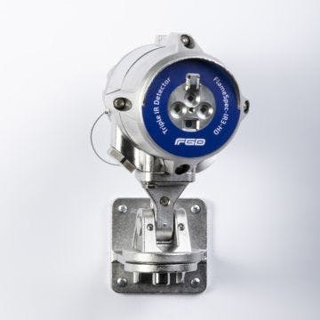 Stainless steel triple IR detector from FGD with blue label to identify type.